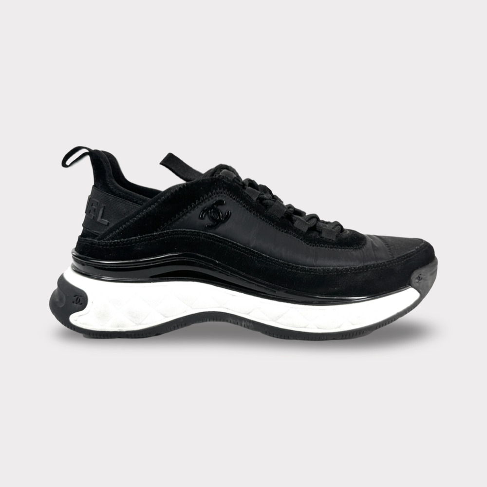 CHANEL Two-Tone Black and White Sneakers